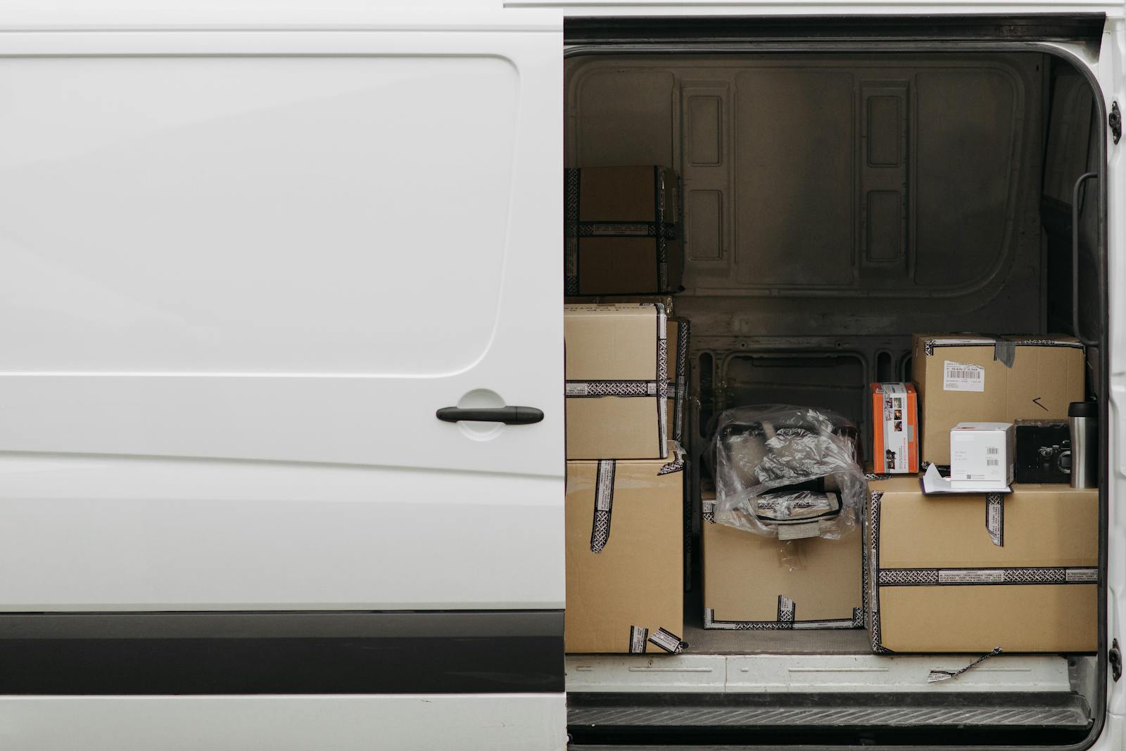 Delivery van loaded with boxes for time-sensitive logistics movement