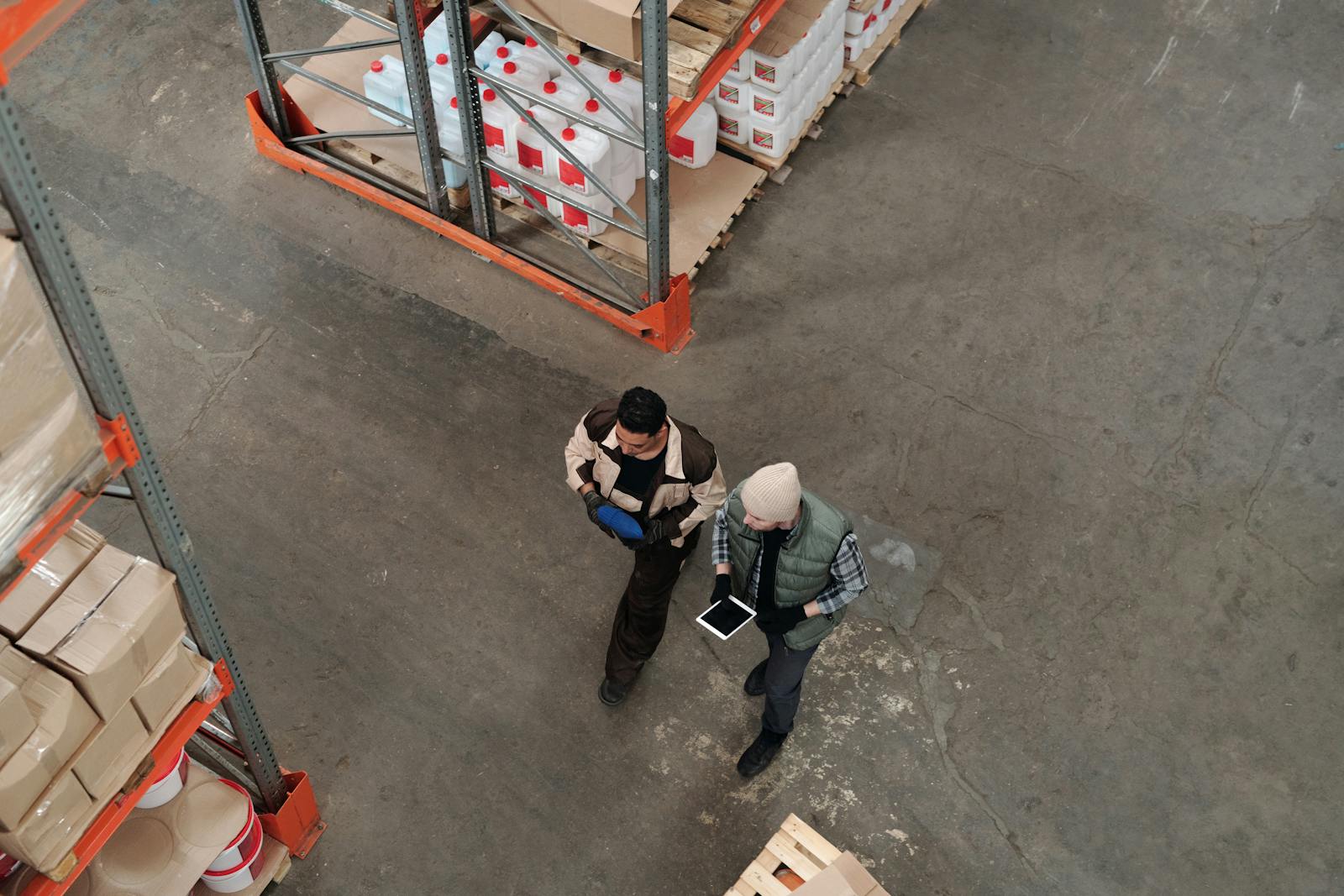 Warehouse operations team coordinating inventory and project movement